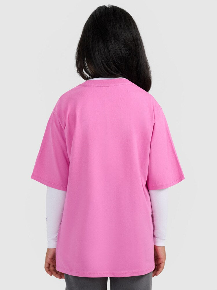 T-shirt oversize z nadrukiem dziewczęcy - różowy
